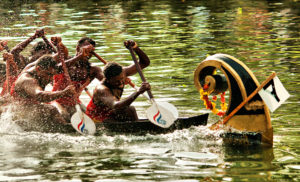 Oarsmen Rowing a Snake Boat
